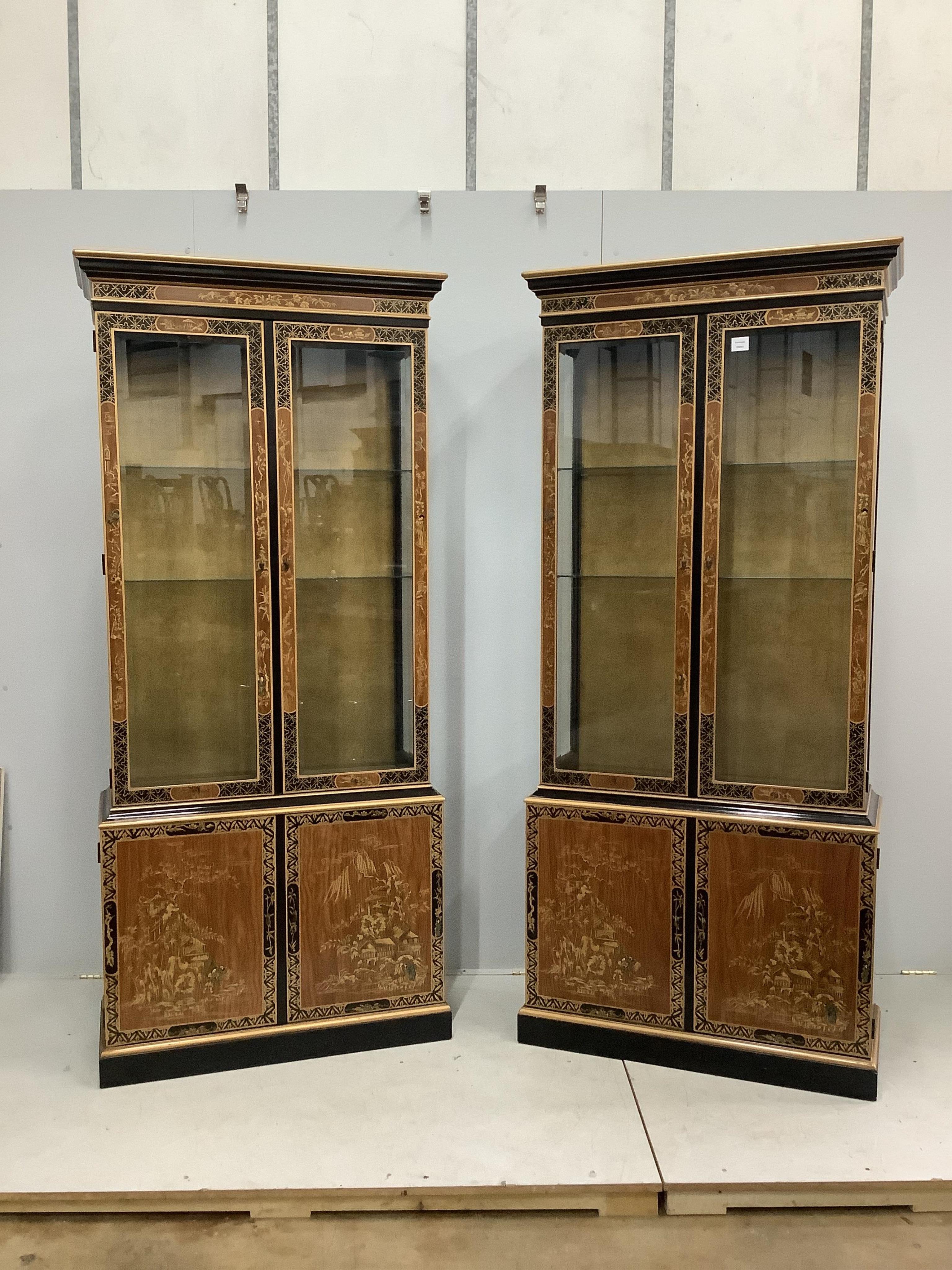 A pair of modern chinoiserie lacquered display cabinets, width 90cm, height 204cm. Condition - good